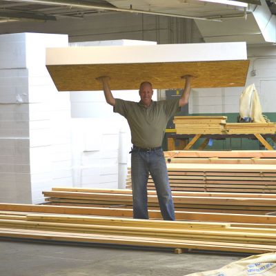 Easy to install, NO crane Needed!   Our 4′x8′ e-SIP Panel only weighs 70lbs.